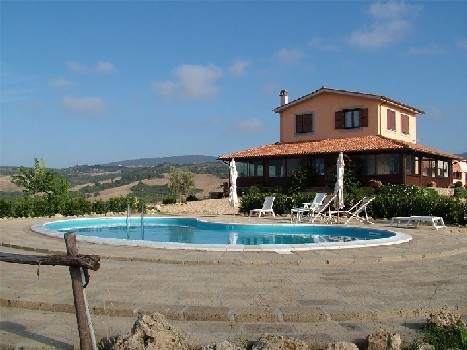 The swimming pool and the house