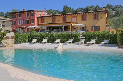 The swimming pool and the house